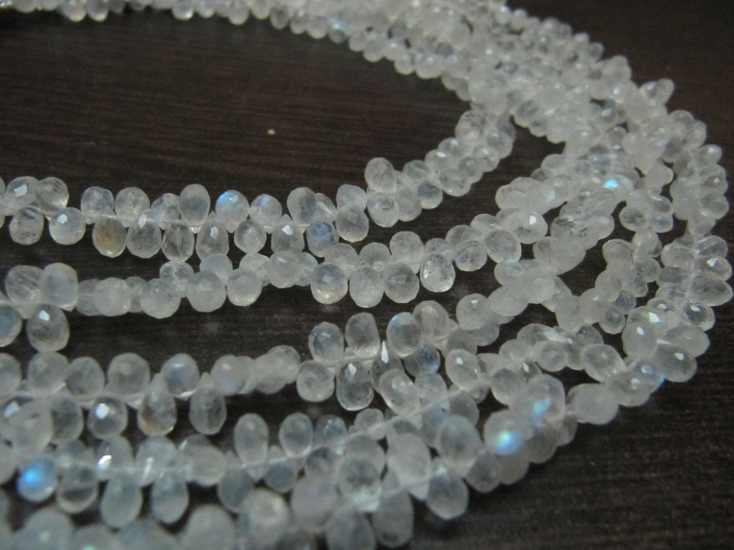 Natural White Rainbow Moonstone Tear Drop Shape 3x5mm Briolette Faceted Beads Strand 9 inches long Wholesale Prices top quality