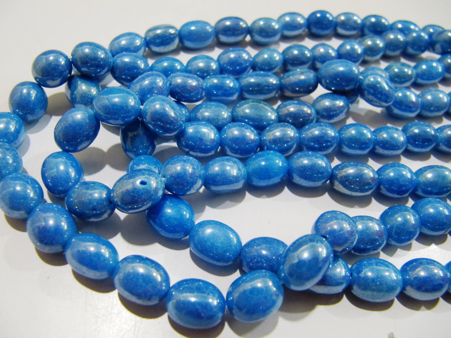 Mystic Coated Blue Topaz Dyed Quartz Oval Plain Smooth Beads 8 to 10mm Strand 8 inch long Beads Wholesale price jewelry making Quartz Bead
