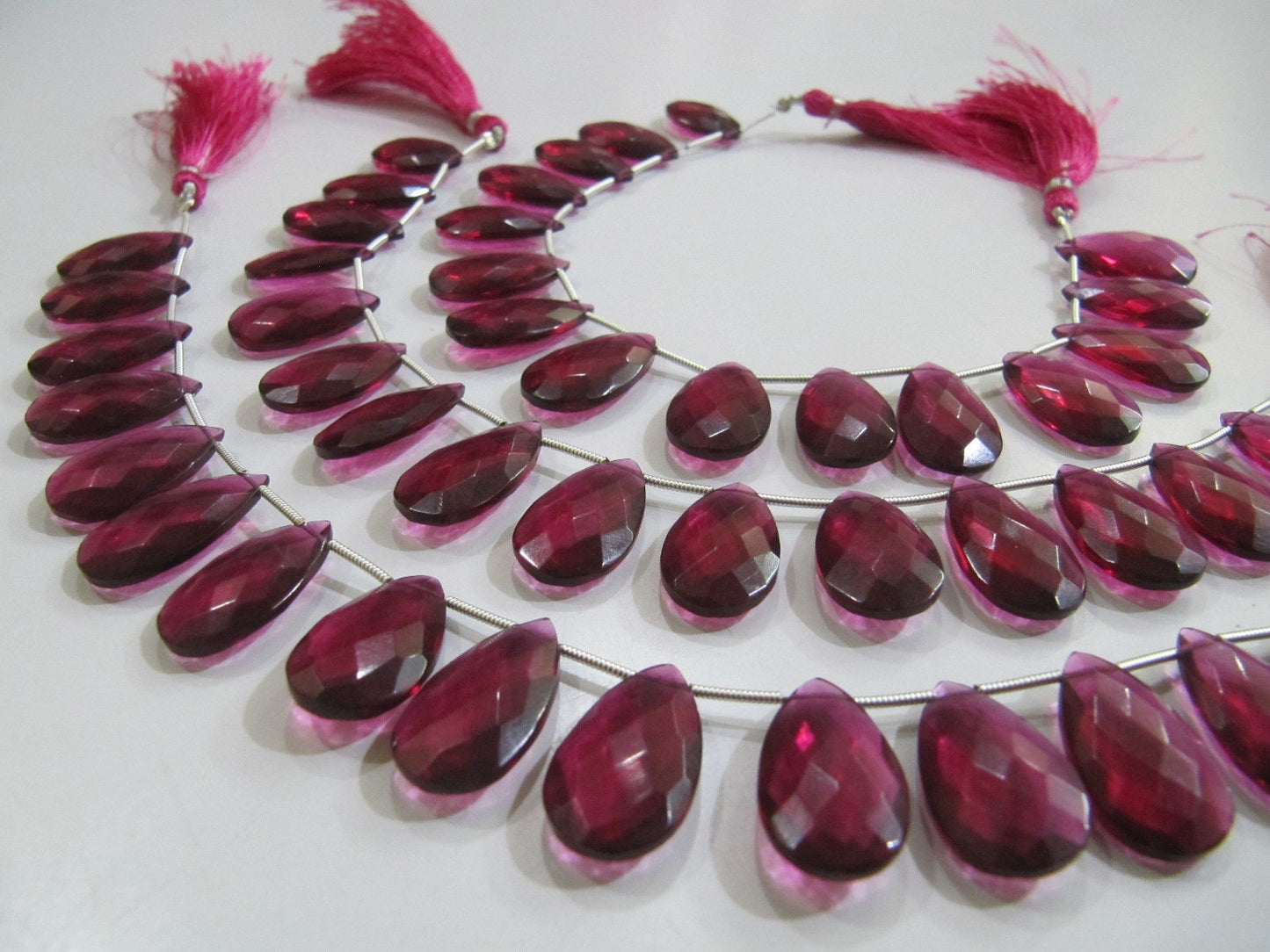 Natural Rubellite Pink Quartz Pear Shape Faceted Briolette Beads Size 12x20 mm Strand Size 8 Inches Long 15 Beads Per Strand Wholesale Rates