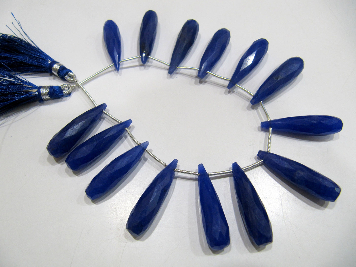 Blue Sapphire Long Tear Drop Shape Briolette Faceted Beads Approx 1 inch Long Sapphire Sold per strand 8 inches long Dyed Beads