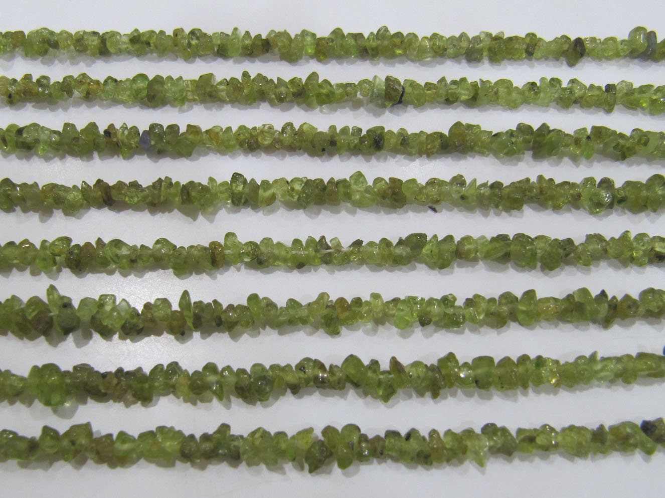 Natural Peridot Irregular Chip Gravel Uncut Nugget 3-4mm Beads Green Color Jewelry Making Beads Strand 34 Inches Long Sold Per Strand