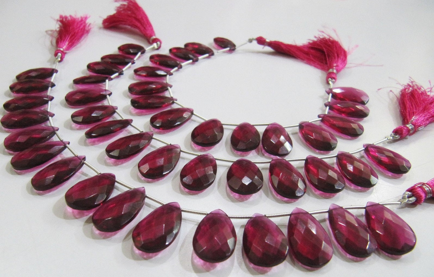 Natural Rubellite Pink Quartz Pear Shape Faceted Briolette Beads Size 12x20 mm Strand Size 8 Inches Long 15 Beads Per Strand Wholesale Rates