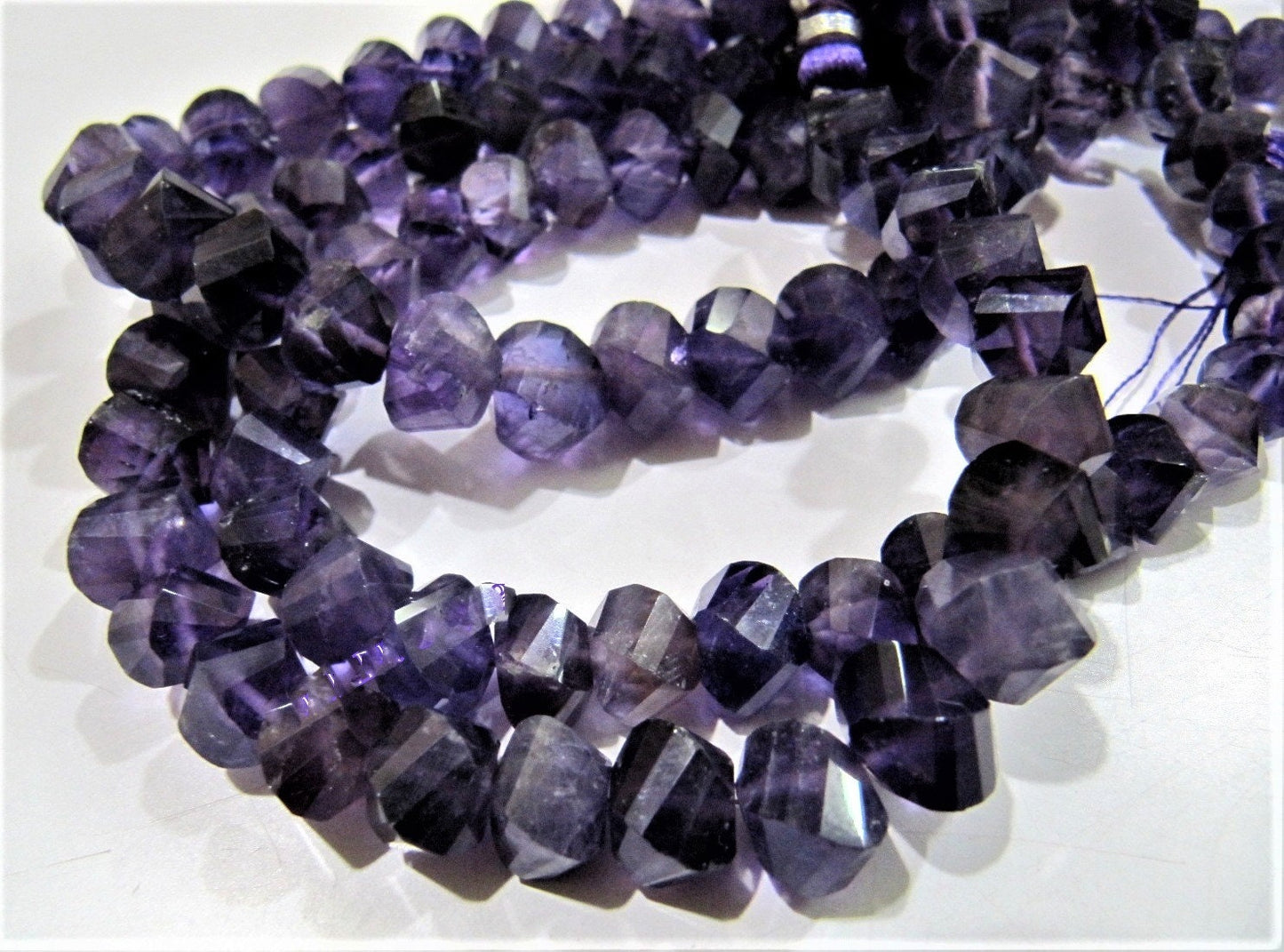 Natural African Amethyst Twisted Briolette Beads 9 to 10mm Sold Per Strand of 10 inches long in Wholesale rates Fancy Shape Stone Beads