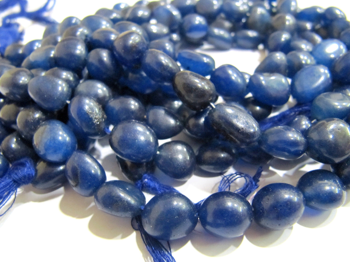 Dyed Sapphire Plain Smooth Nugget Shape Beads Smooth Tumble Oval Beads 10 to 15 mm Strand 15 inches long Gemstone Beads Wholesale Prices