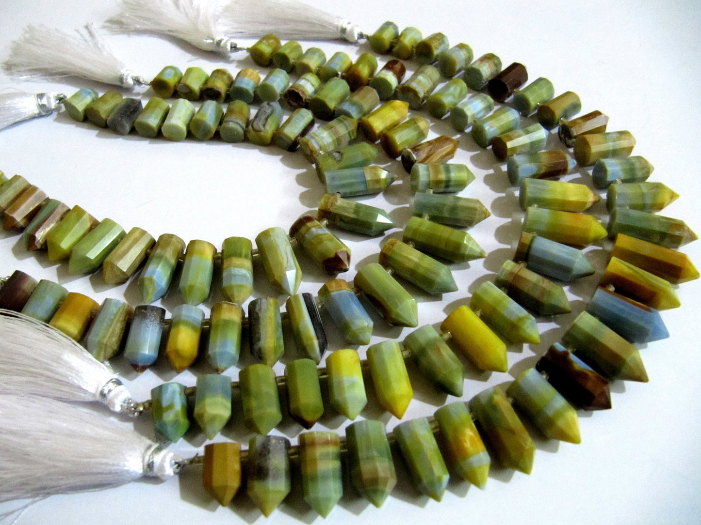 Natural Boulder Opal Briolette Faceted Pencil Bullet Shape 0.5 to 1 inch Long Beads Strand 8 inches long Wholesale Prices