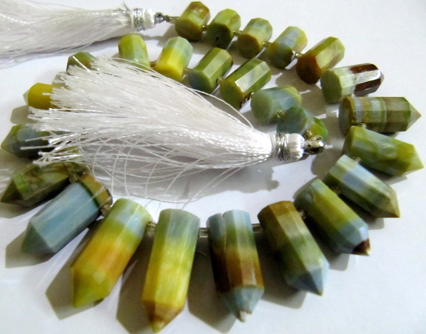 Natural Boulder Opal Briolette Faceted Pencil Bullet Shape 0.5 to 1 inch Long Beads Strand 8 inches long Wholesale Prices