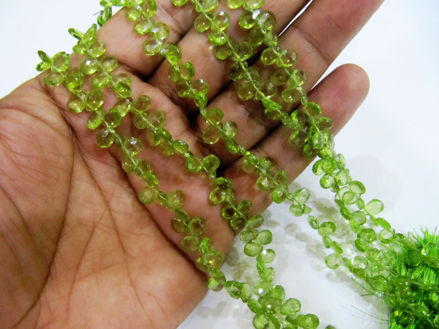 Natural Peridot Pear shape Briolette Beads size 4x6mm to 4x8mm strand 8 inches long. sold per strand