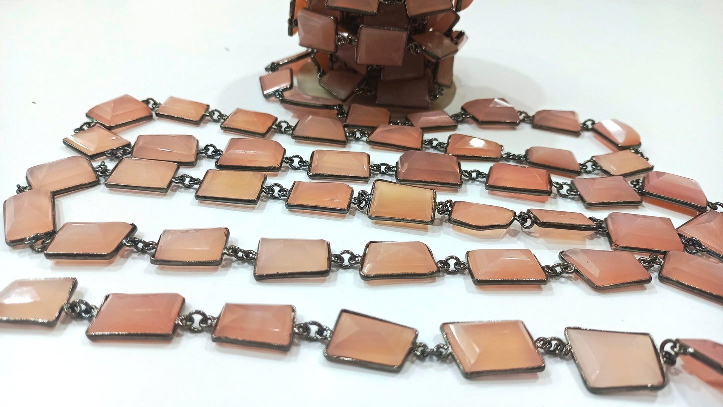 Natural pink Chalcedony 17 to 20mm Free Shape Nugget Tumbled Briolette Faceted Bezel Connector Chain Sold Per Foot Black Plated Chain.