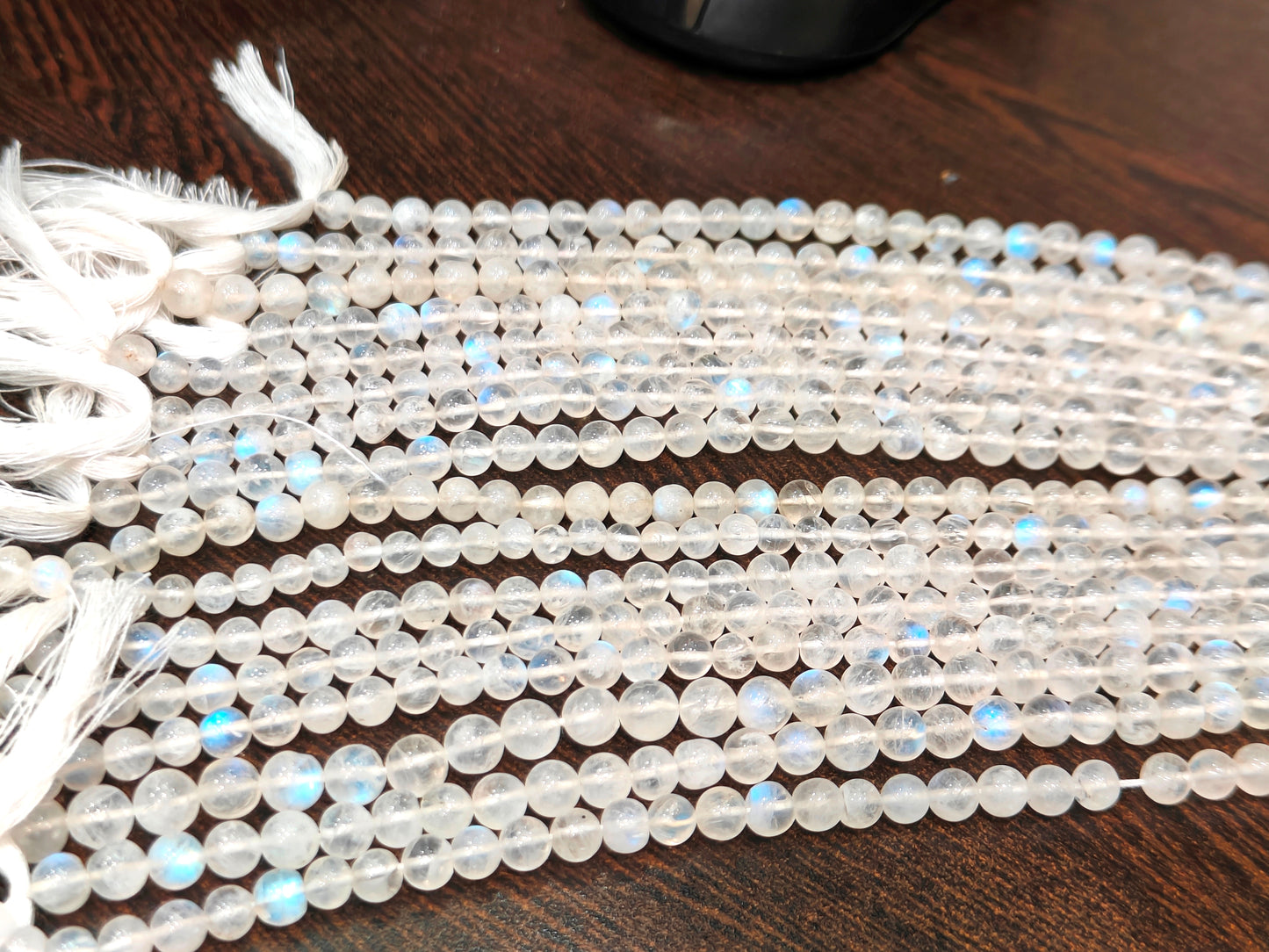 Natural white rainbow moonstone 4 to 6 mm round plain smooth beads sold per strand 8 inches