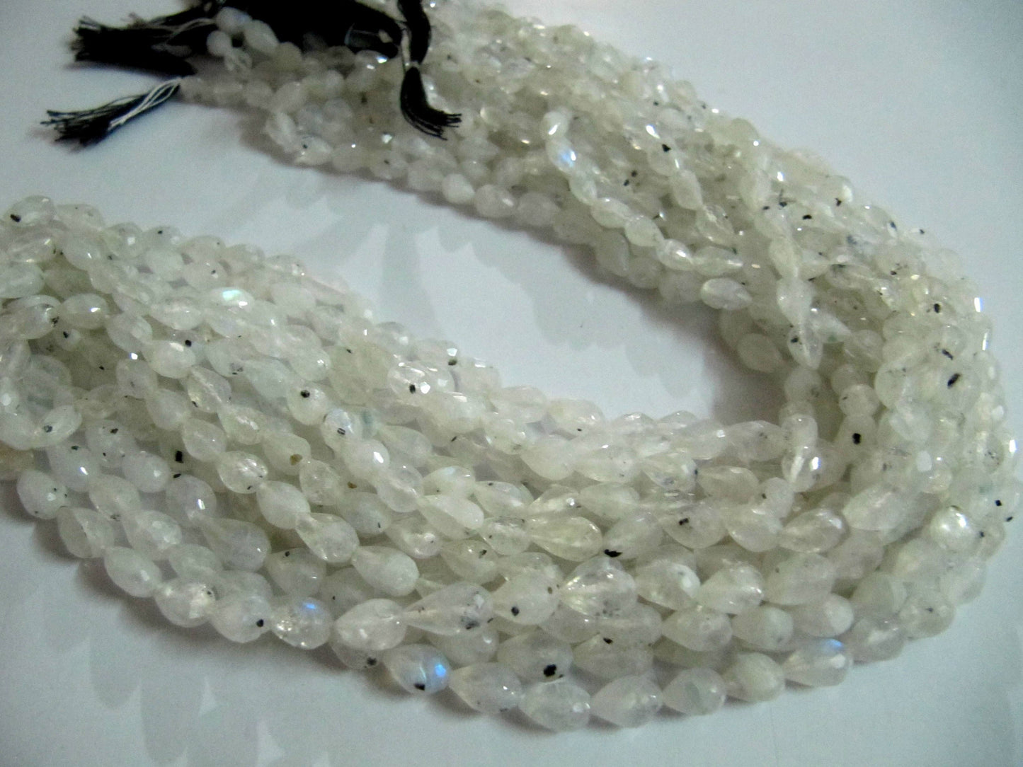 Natural White Rainbow Moonstone Tear Drop shape Briolette 5x7 mm Beads  Strand 13 inch long High Quality Blue Flashy Beads Wholesale Prices