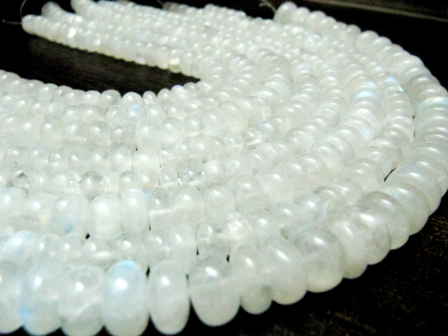 Natural White Rainbow Moonstone Rondelle Plain smooth Beads 7 to 10mm Strand 8 inches long Best Quality Blue Flashy Beads Wholesale Prices