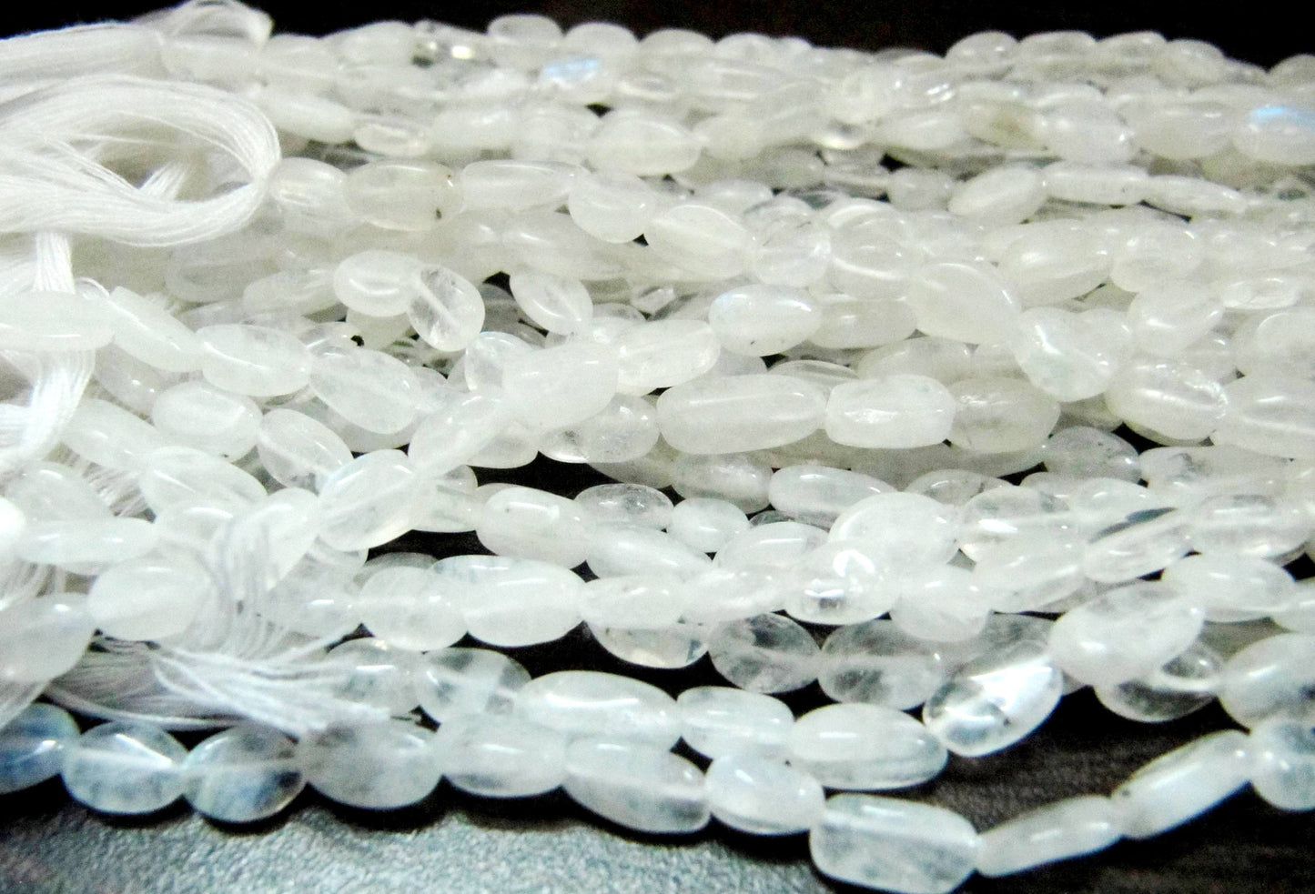 Natural White Rainbow Moonstone Oval Plain smooth Beads 6 to 8mm Strand 13 inches long Best Quality Blue Flashy Beads Wholesale Prices