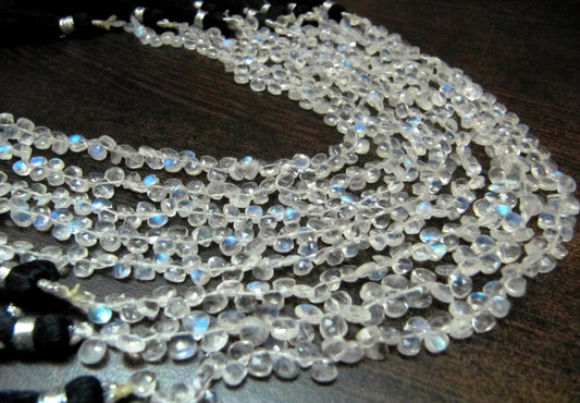 Natural White Rainbow Moonstone 4 to 8mm Heart shape Briolette Beads Strand 8 inches long High Quality Blue Flashy Beads Wholesale Prices