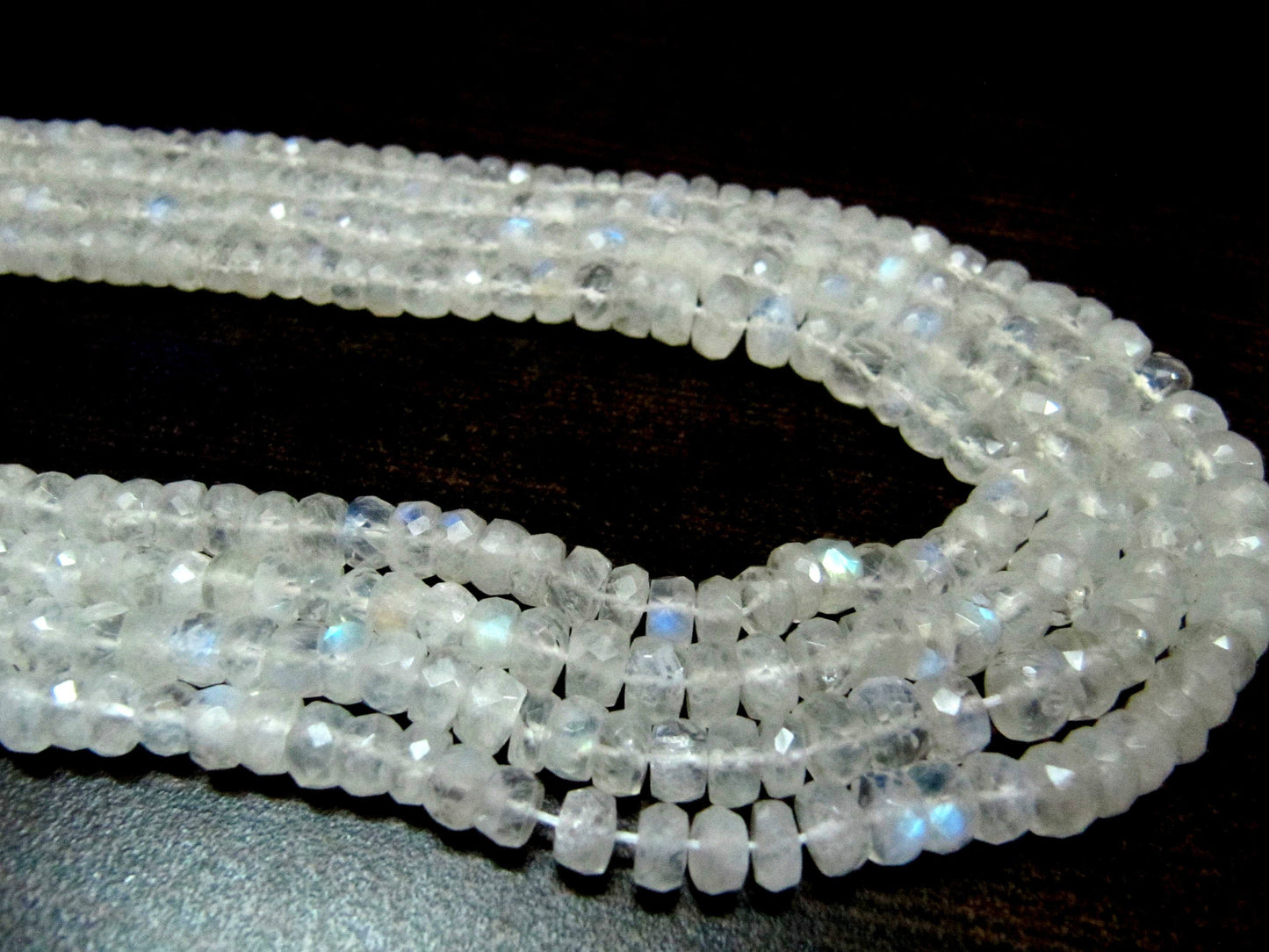 Natural white Rainbow Moonstone Rondelle Faceted 4to7mm Graduated Beads Strand 8 inches long High Quality Blue Flashy Beads Wholesale Prices