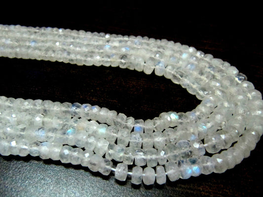 Natural white Rainbow Moonstone Rondelle Faceted 4to7mm Graduated Beads Strand 8 inches long High Quality Blue Flashy Beads Wholesale Prices