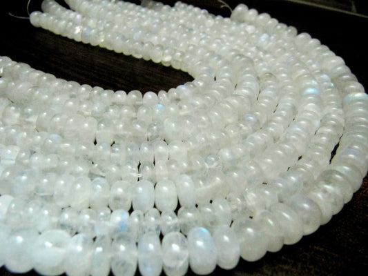 Natural White Rainbow Moonstone Rondelle Plain smooth Beads 7 to 10mm Strand 8 inches long Best Quality Blue Flashy Beads Wholesale Prices
