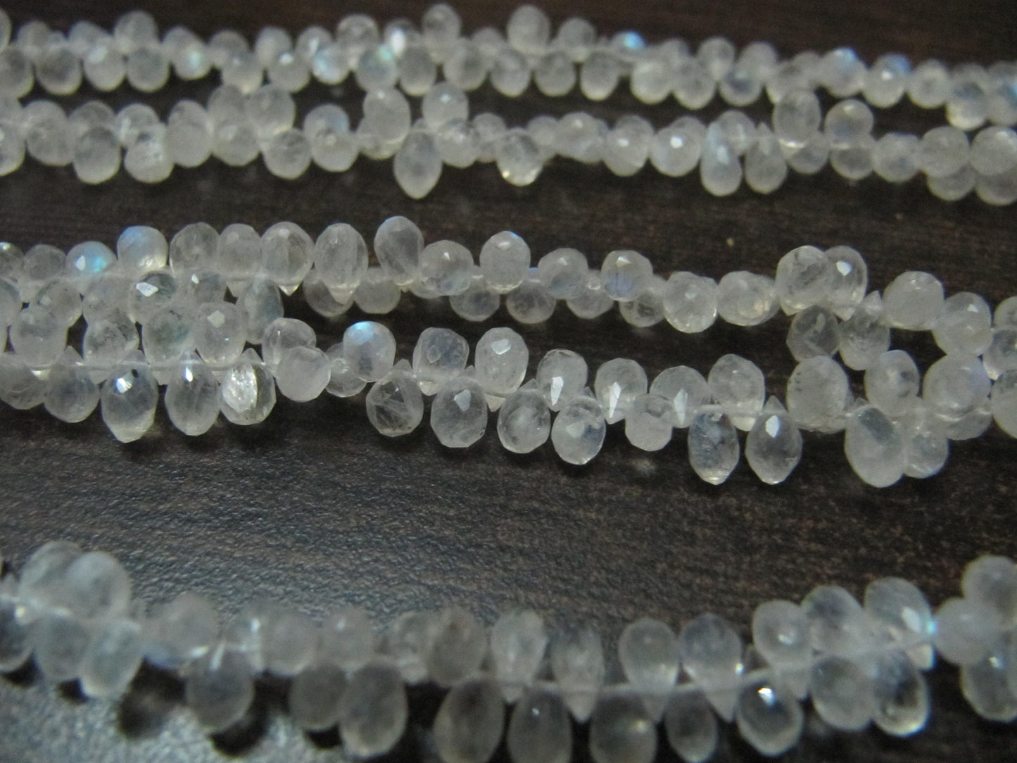 Natural White Rainbow Moonstone Tear Drop Shape 3x5mm Briolette Faceted Beads Strand 9 inches long Wholesale Prices top quality