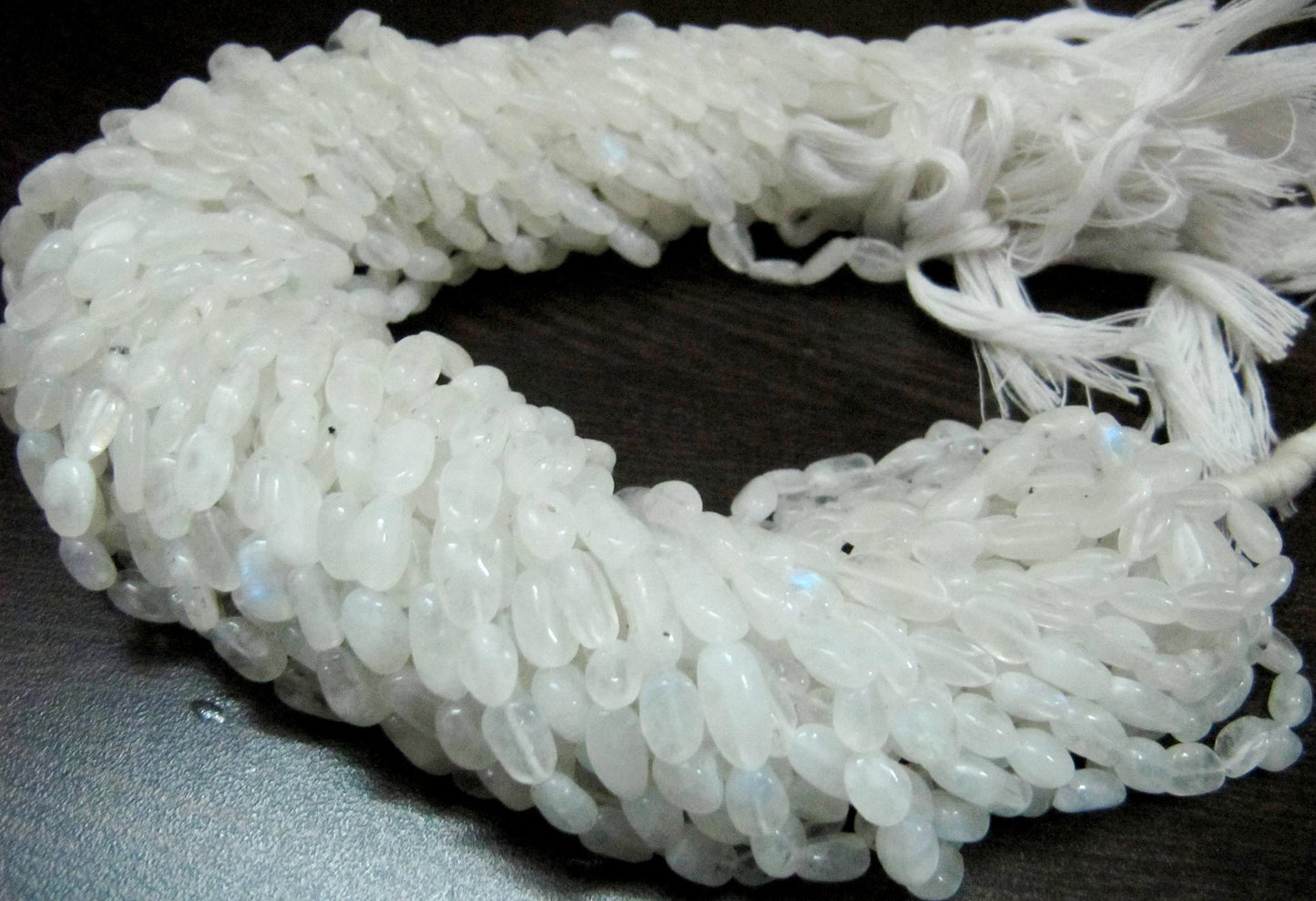 Natural White Rainbow Moonstone Oval Plain smooth Beads 6 to 8mm Strand 13 inches long Best Quality Blue Flashy Beads Wholesale Prices