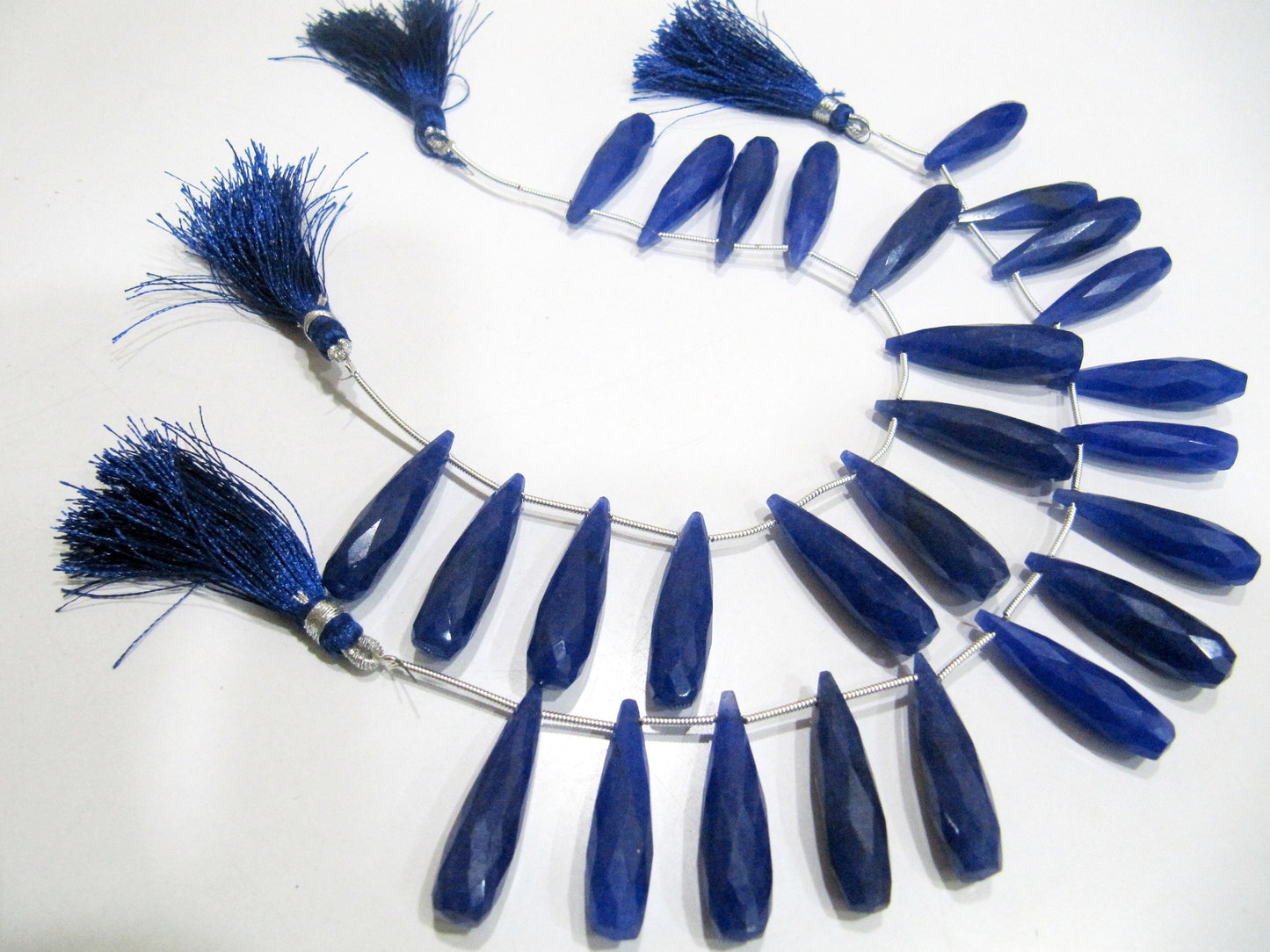 Blue Sapphire Long Tear Drop  Shape Briolette  Faceted Beads  Approx 1 inch Long Sapphire Sold per strand  8 inches long Dyed Beads