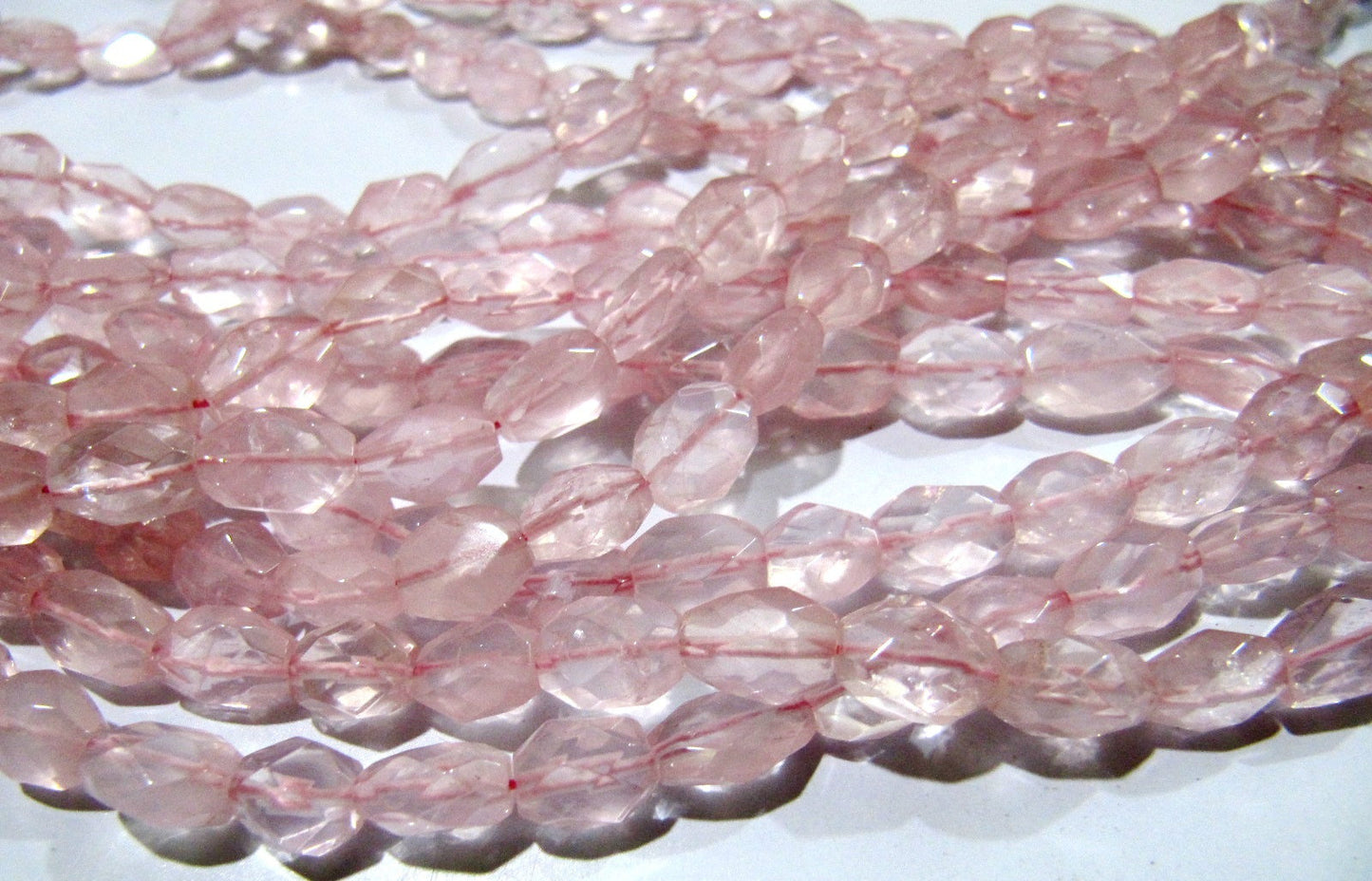 Natural Rose Quartz Oval Faceted Beads  Size 5x7mm to 6x8mm  Mani Shape Gemstone Beads  Strands approx 13 inches long sold per Strand