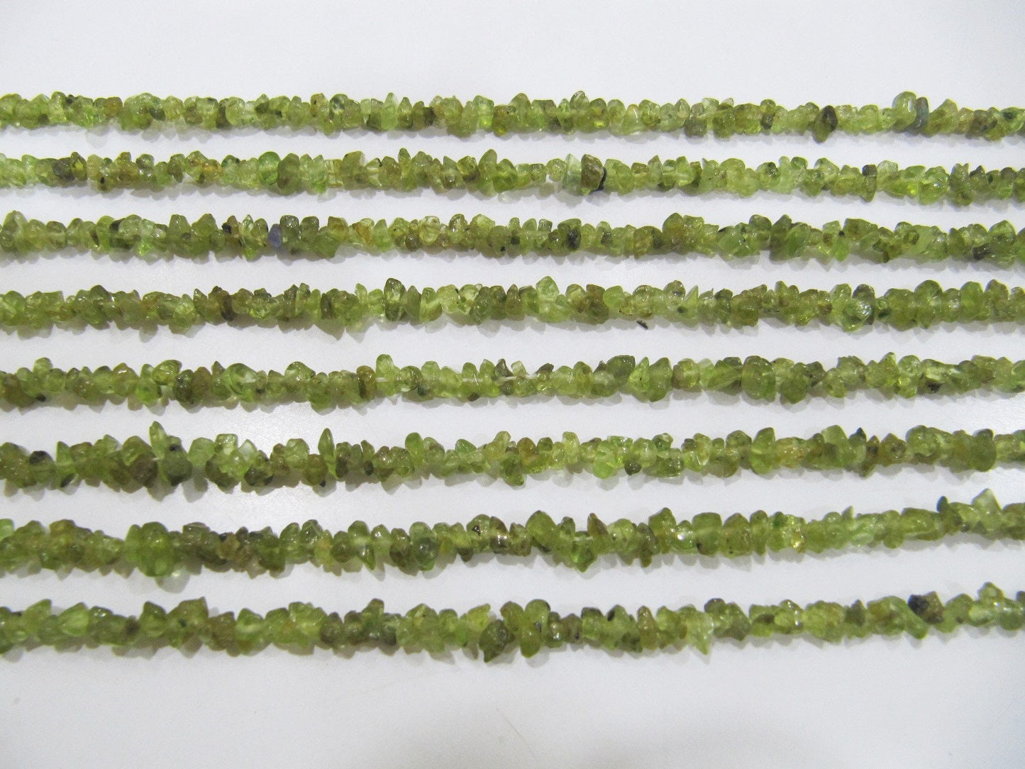 Natural Peridot Irregular Chip Gravel Uncut Nugget 3-4mm Beads Green Color Jewelry Making Beads Strand 34 Inches Long Sold Per Strand