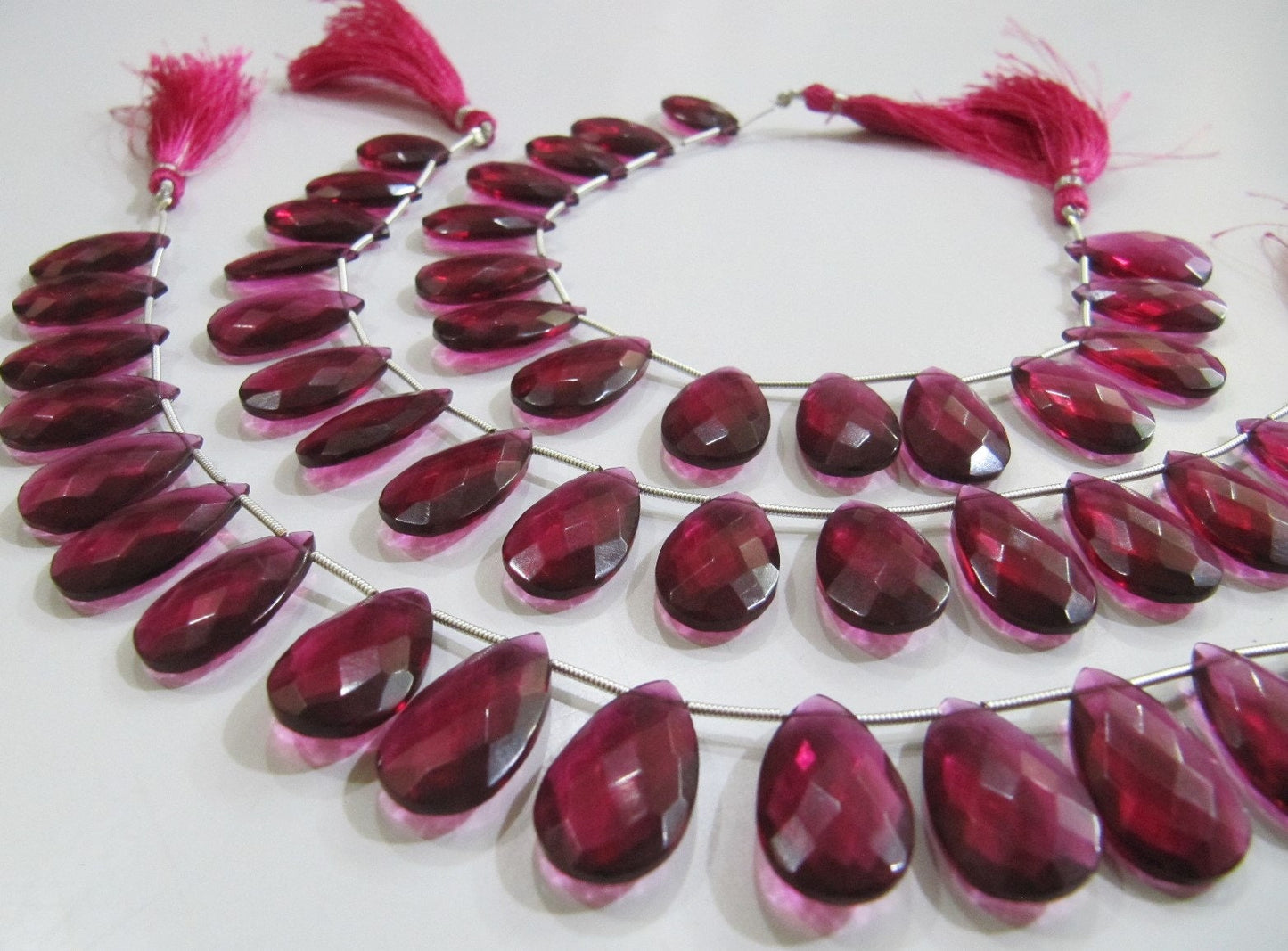 Natural Rubellite Pink Quartz Pear Shape Faceted Briolette Beads Size 12x20 mm Strand Size 8 Inches Long 15 Beads Per Strand Wholesale Rates