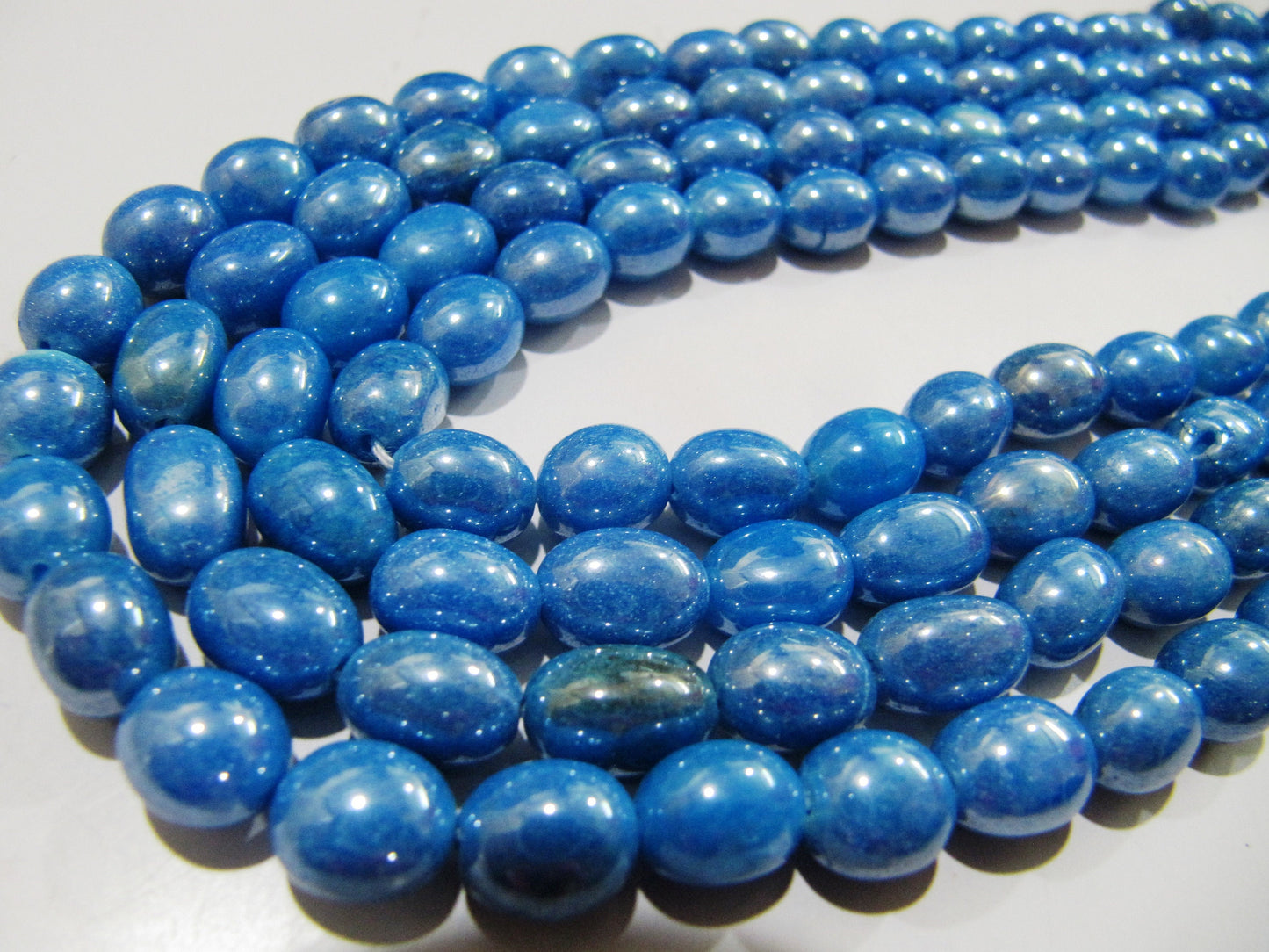 Mystic Coated Blue Topaz Dyed Quartz Oval Plain Smooth Beads 8 to 10mm Strand 8 inch long Beads Wholesale price jewelry making Quartz Bead