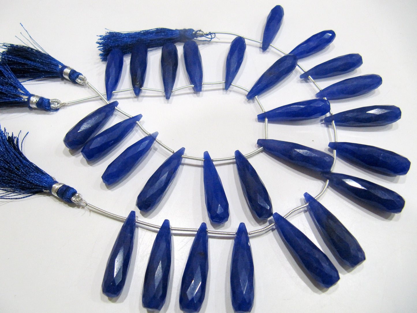 Blue Sapphire Long Tear Drop  Shape Briolette  Faceted Beads  Approx 1 inch Long Sapphire Sold per strand  8 inches long Dyed Beads