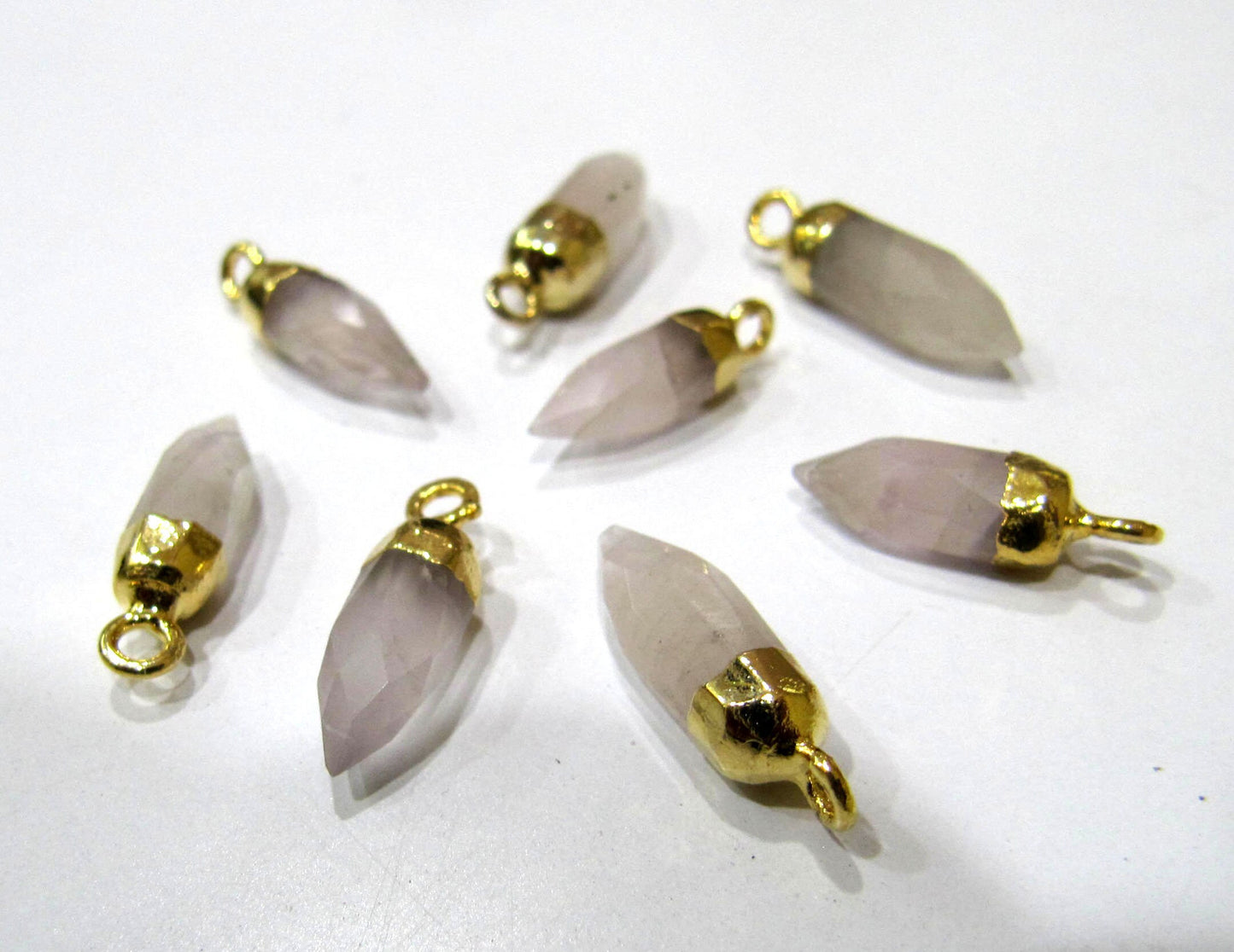 2 piece Natural Rose Quartz Tiny Bullet Charm Pointer Pendant  Single Loop Connector Charm  Gold Electroplated approximately 0.5 inch long