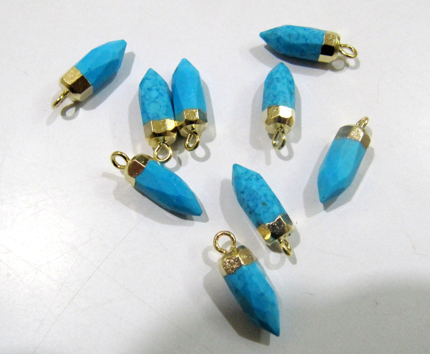 2 piece setTurquoise Magnesite Tiny Bullet Charm Pointer Pendant  Single Loop Connector Charm  Electroplated approximately 0.5 inch long
