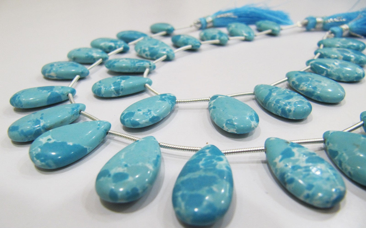 AAA Quality Turquoise Pear Shape Plain Smooth Size 9x18mm To 10x20mm Magnesite Beads Strand 8 inches Long Sold Per Strand Wholesale Price