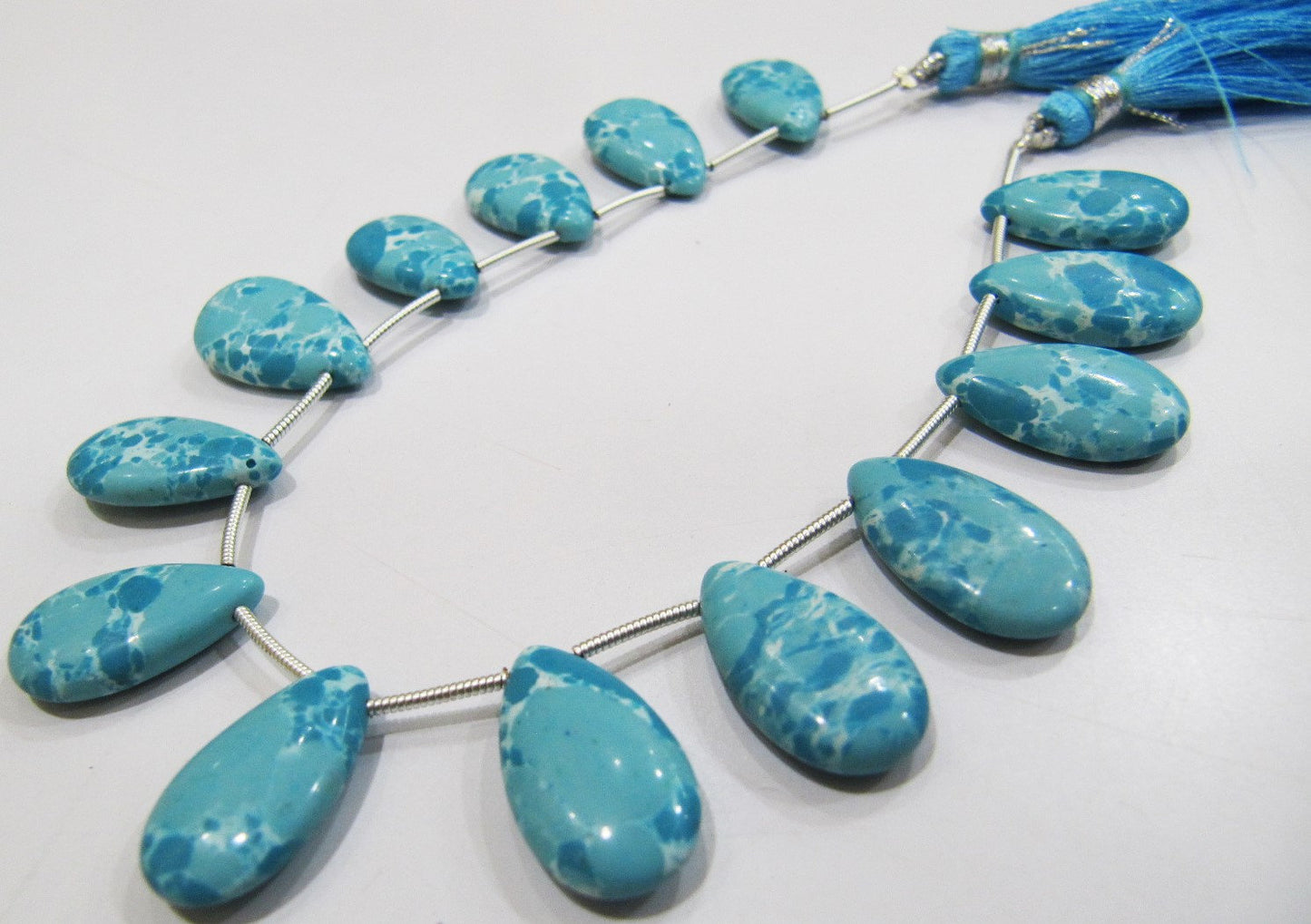 AAA Quality Turquoise Pear Shape Plain Smooth Size 9x18mm To 10x20mm Magnesite Beads Strand 8 inches Long Sold Per Strand Wholesale Price