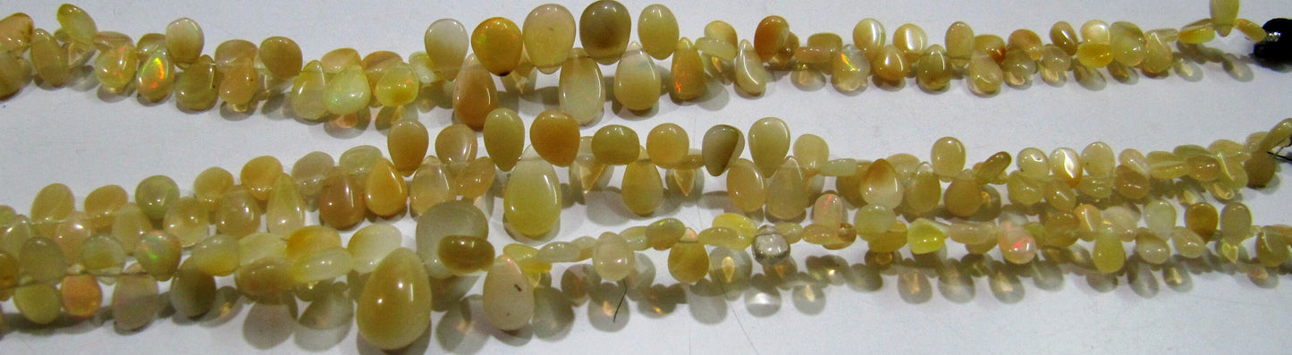 Best Quality Ethiopian Opal Golden Beads, Flat Drop Smooth Beads Size 4x6mm to 6x9mm, Strand 8 inch Long with approx. 70 beads per strand
