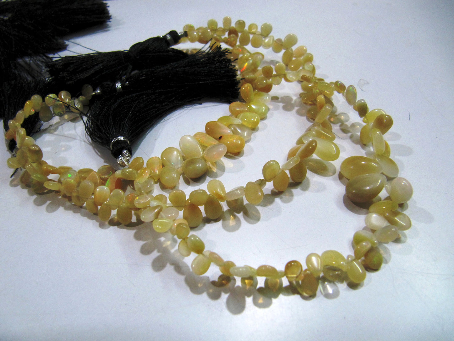 Best Quality Ethiopian Opal Golden Beads, Flat Drop Smooth Beads Size 4x6mm to 6x9mm, Strand 8 inch Long with approx. 70 beads per strand