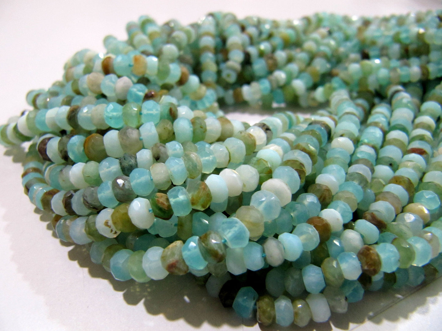 Natural Peruvian Opal Rondelle Briolette faceted Beads 3mm to 5mm best Quality Beads Strand 13 inches Long  Israel Cut gemstone beads