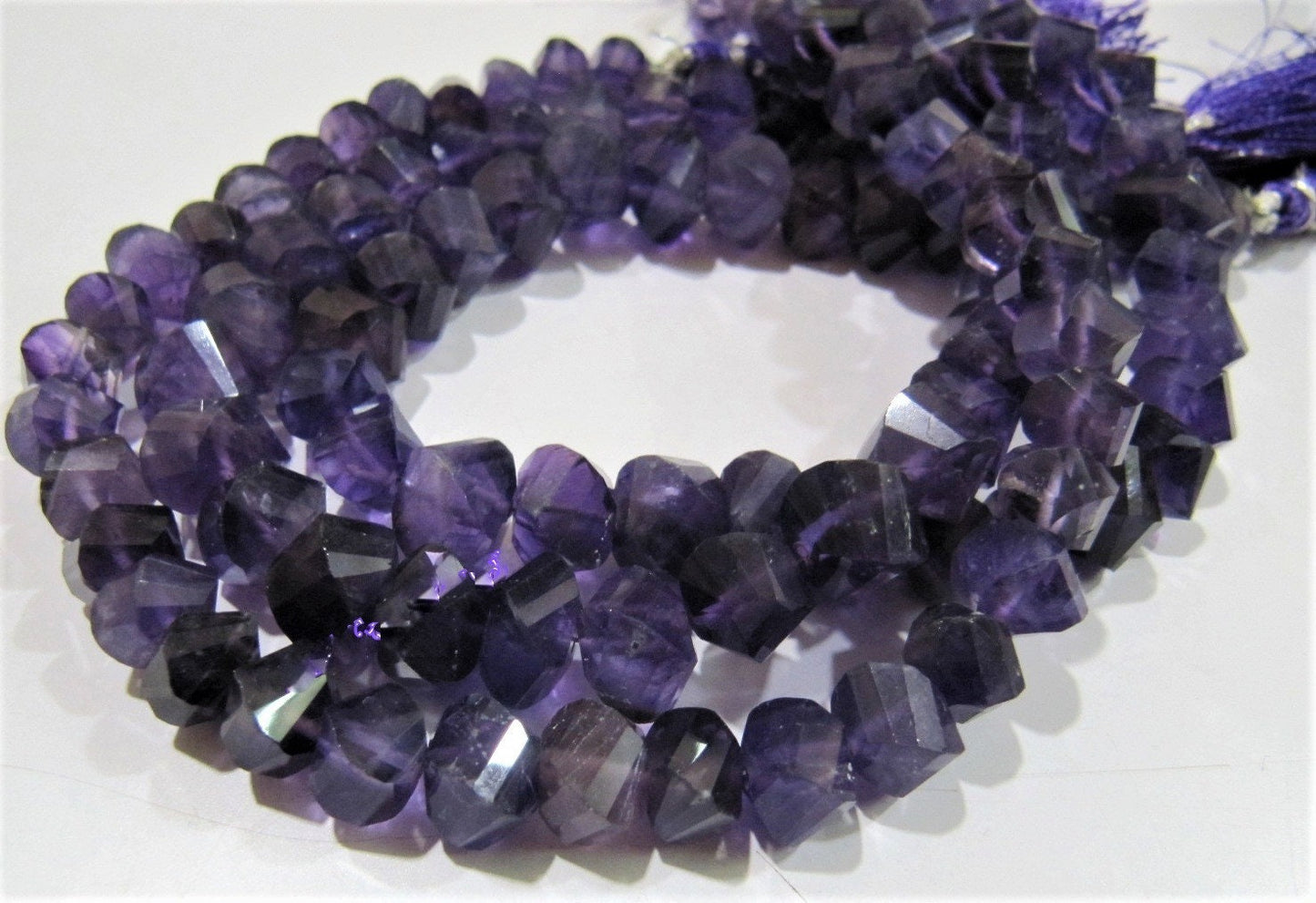 Natural African Amethyst Twisted Briolette Beads 9 to 10mm Sold Per Strand of 10 inches long in Wholesale rates Fancy Shape Stone Beads