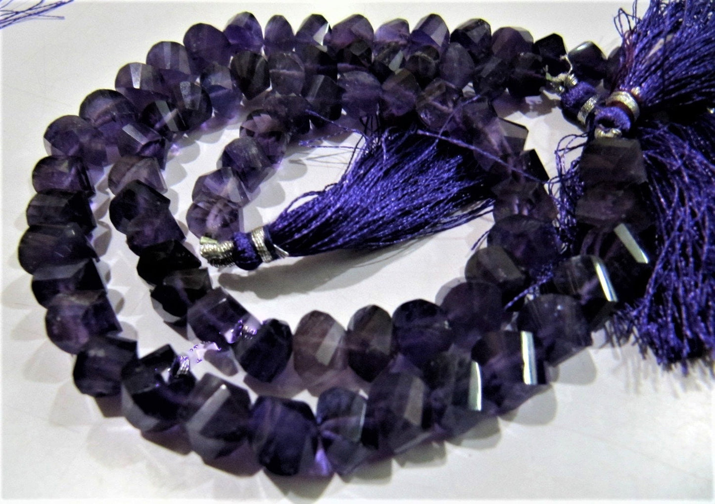 Natural African Amethyst Twisted Briolette Beads 9 to 10mm Sold Per Strand of 10 inches long in Wholesale rates Fancy Shape Stone Beads