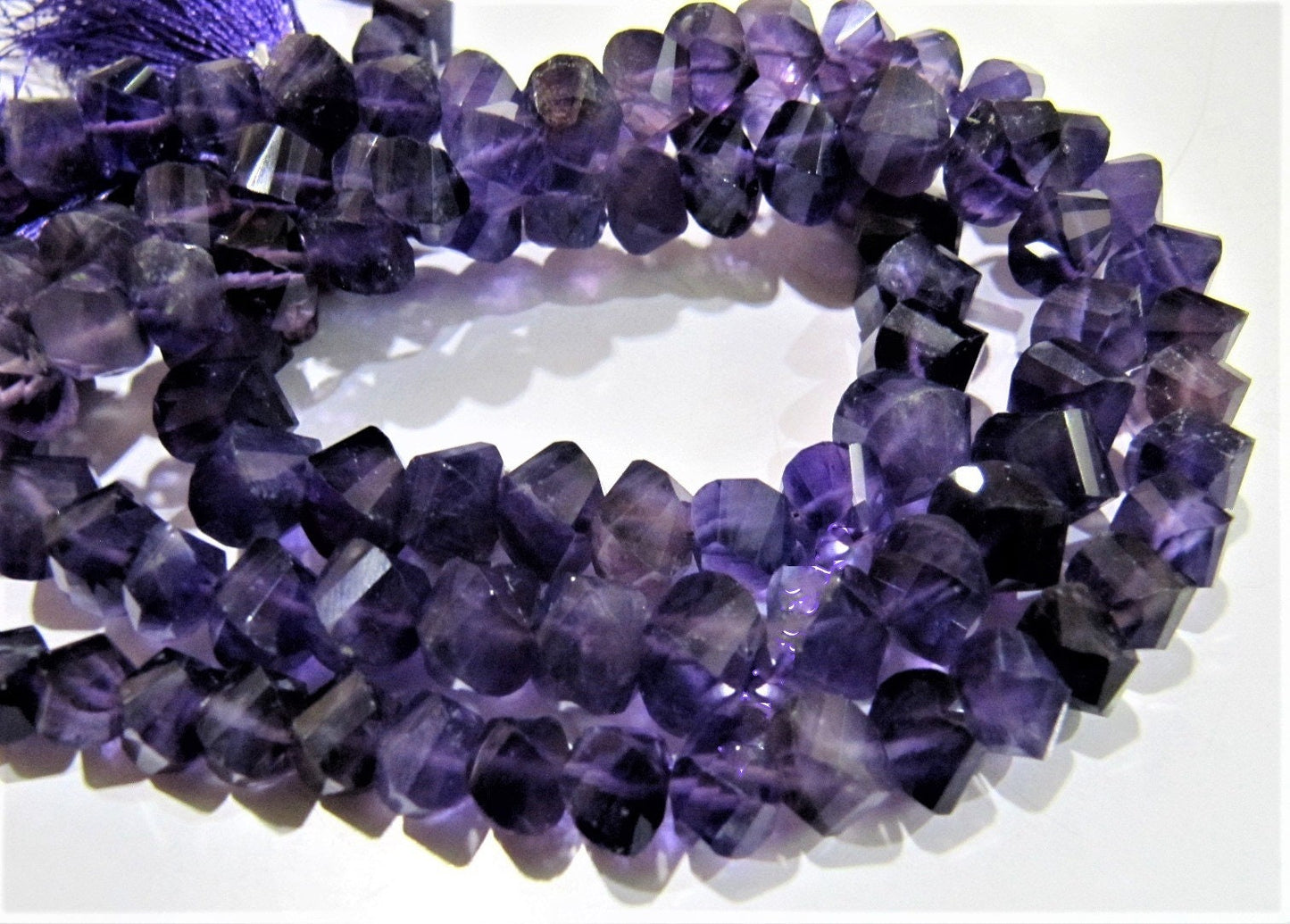 Natural African Amethyst Twisted Briolette Beads 9 to 10mm Sold Per Strand of 10 inches long in Wholesale rates Fancy Shape Stone Beads