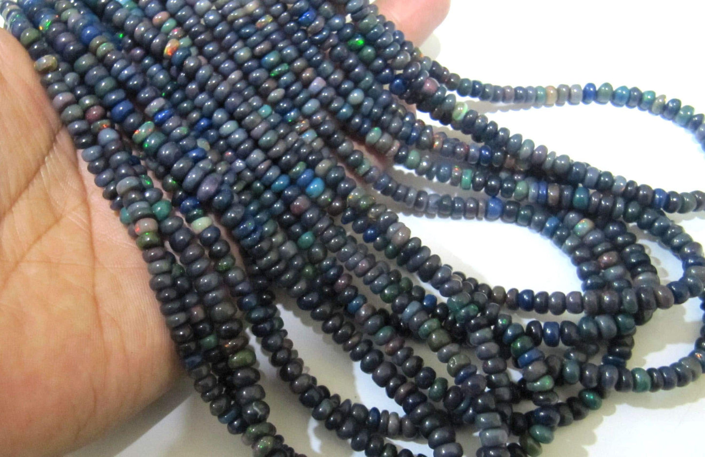 Natural Ethiopian Black Opal Rondelle Plain Smooth Beads Welo Fire 4mm To 5mm Graduated Beads Strand 16 Inches Long Jewelry Making Beads