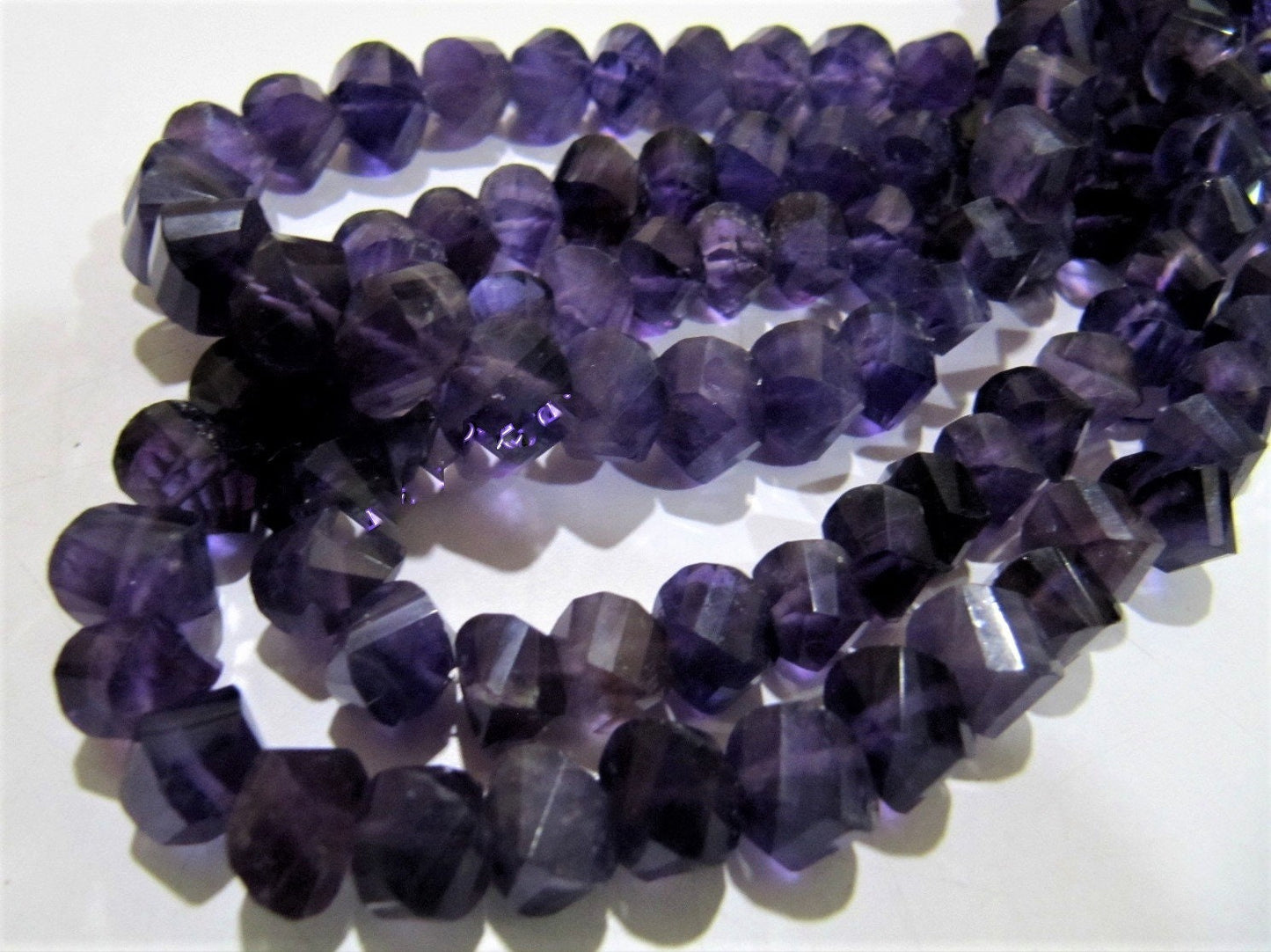 Natural African Amethyst Twisted Briolette Beads 9 to 10mm Sold Per Strand of 10 inches long in Wholesale rates Fancy Shape Stone Beads