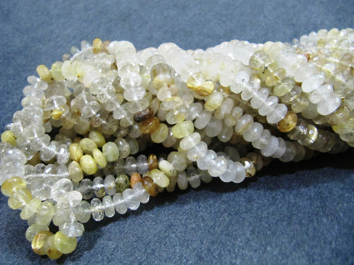 Golden Rutilated quartz Rondelle Faceted 8 to 9mm Golden Rutile faceted Strands 8inches long Semi Precious beads Wholesale rates