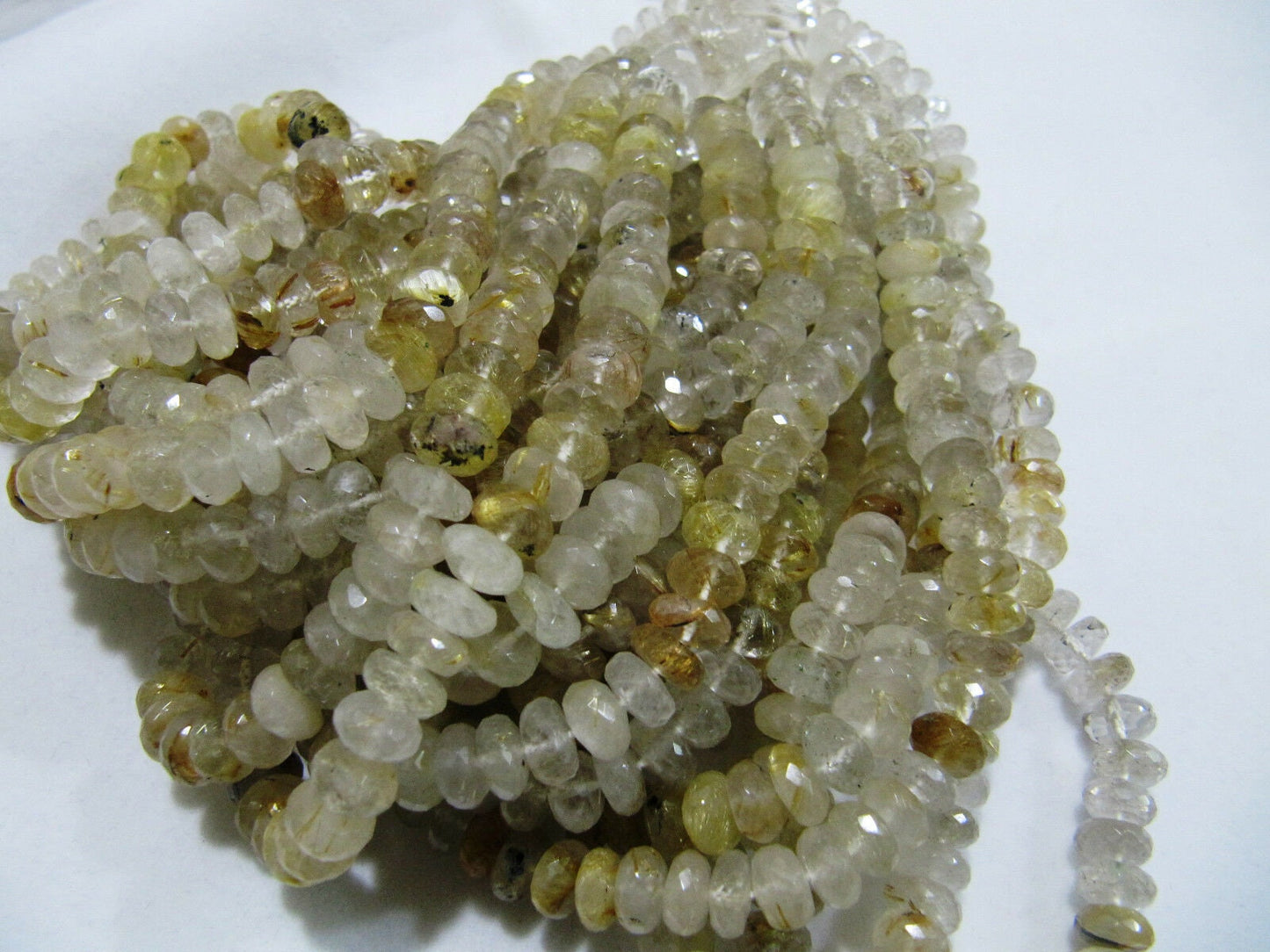 Golden Rutilated quartz Rondelle Faceted 8 to 9mm Golden Rutile faceted Strands 8inches long Semi Precious beads Wholesale rates