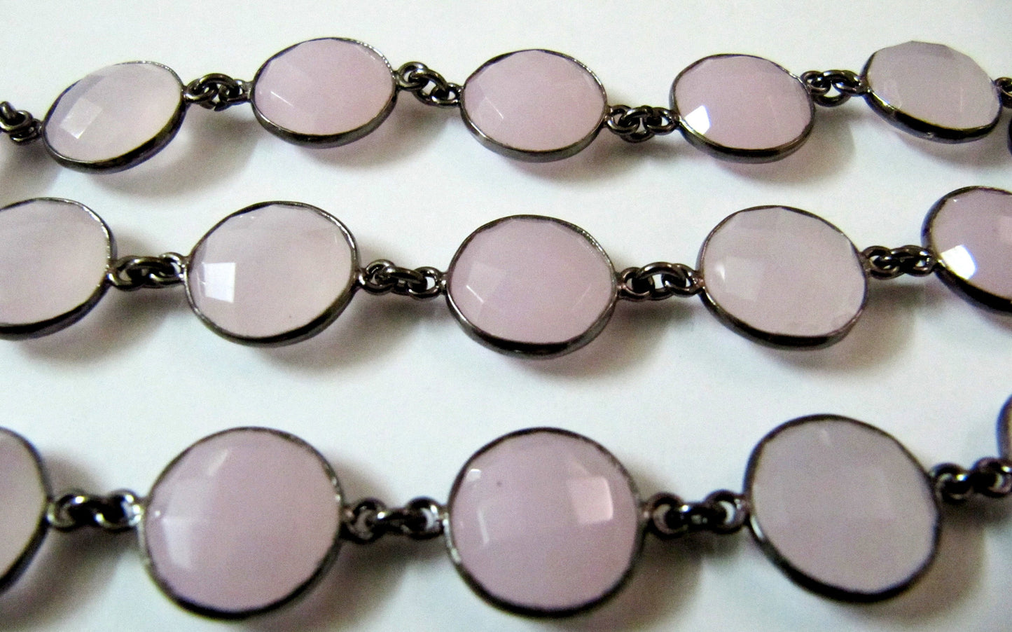 Natural Rose Quartz Coin Shape Briolette Faceted Bezel Connector Chain Sold Per Foot High Quality Gun Metal Finished Wholesale Prices