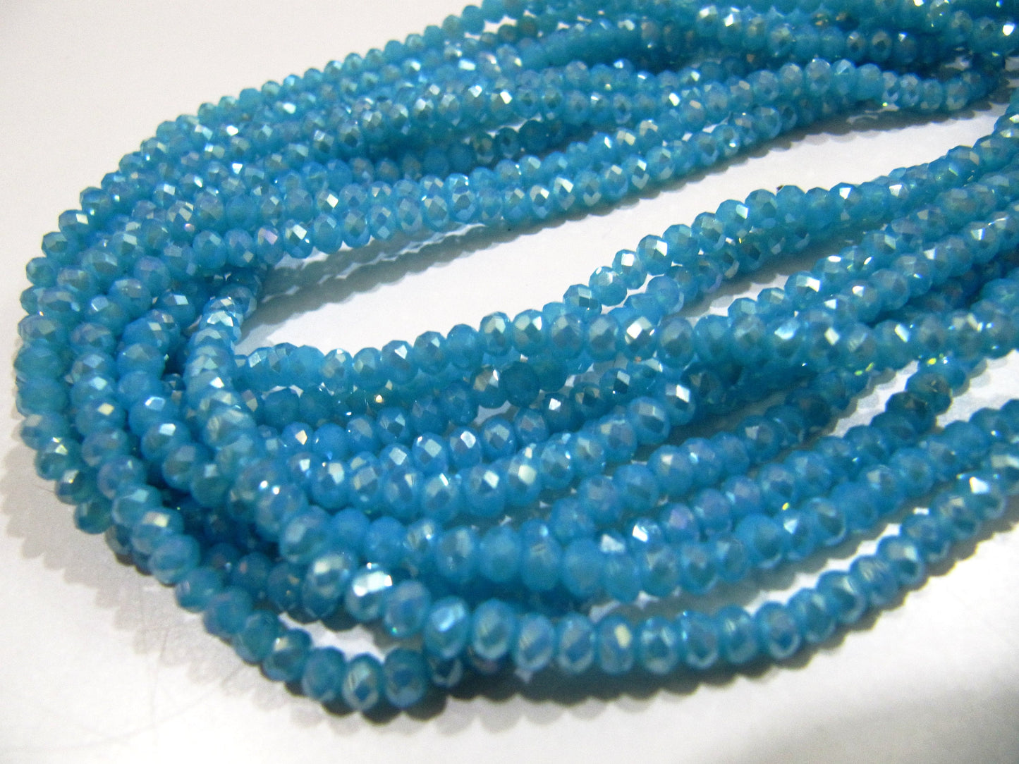 AB Coated Aqua Blue Chalcedony Hydro Quartz Rondelle Faceted Size 3-4mm Beads Strand 14 inches long Wholesale prices