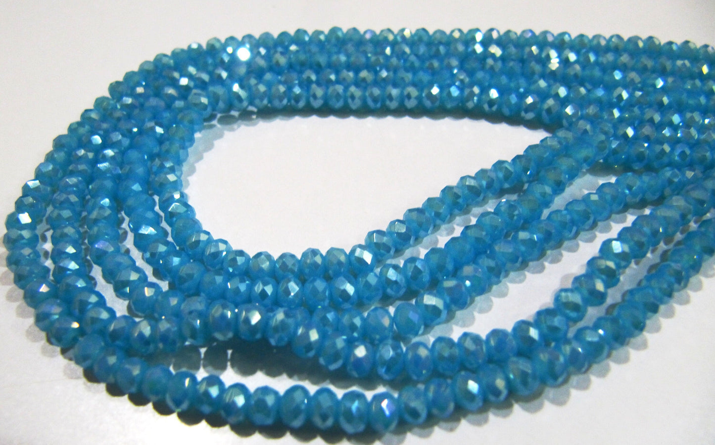AB Coated Aqua Blue Chalcedony Hydro Quartz Rondelle Faceted Size 3-4mm Beads Strand 14 inches long Wholesale prices