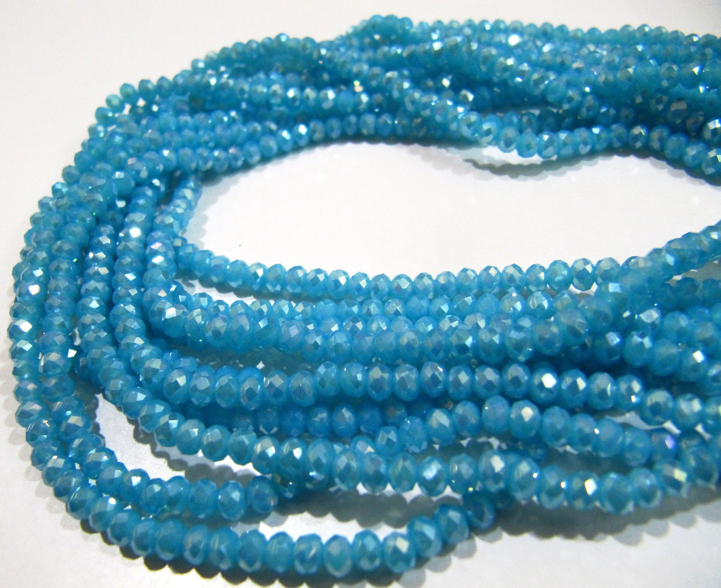AB Coated Aqua Blue Chalcedony Hydro Quartz Rondelle Faceted Size 3-4mm Beads Strand 14 inches long Wholesale prices