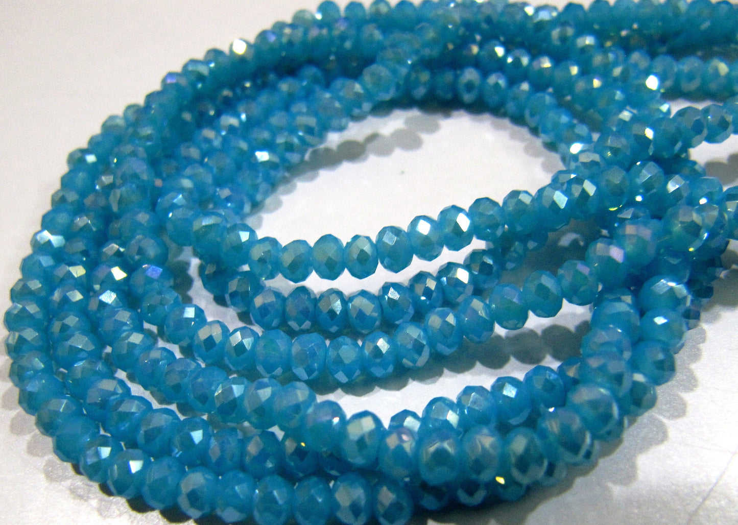 AB Coated Aqua Blue Chalcedony Hydro Quartz Rondelle Faceted Size 3-4mm Beads Strand 14 inches long Wholesale prices