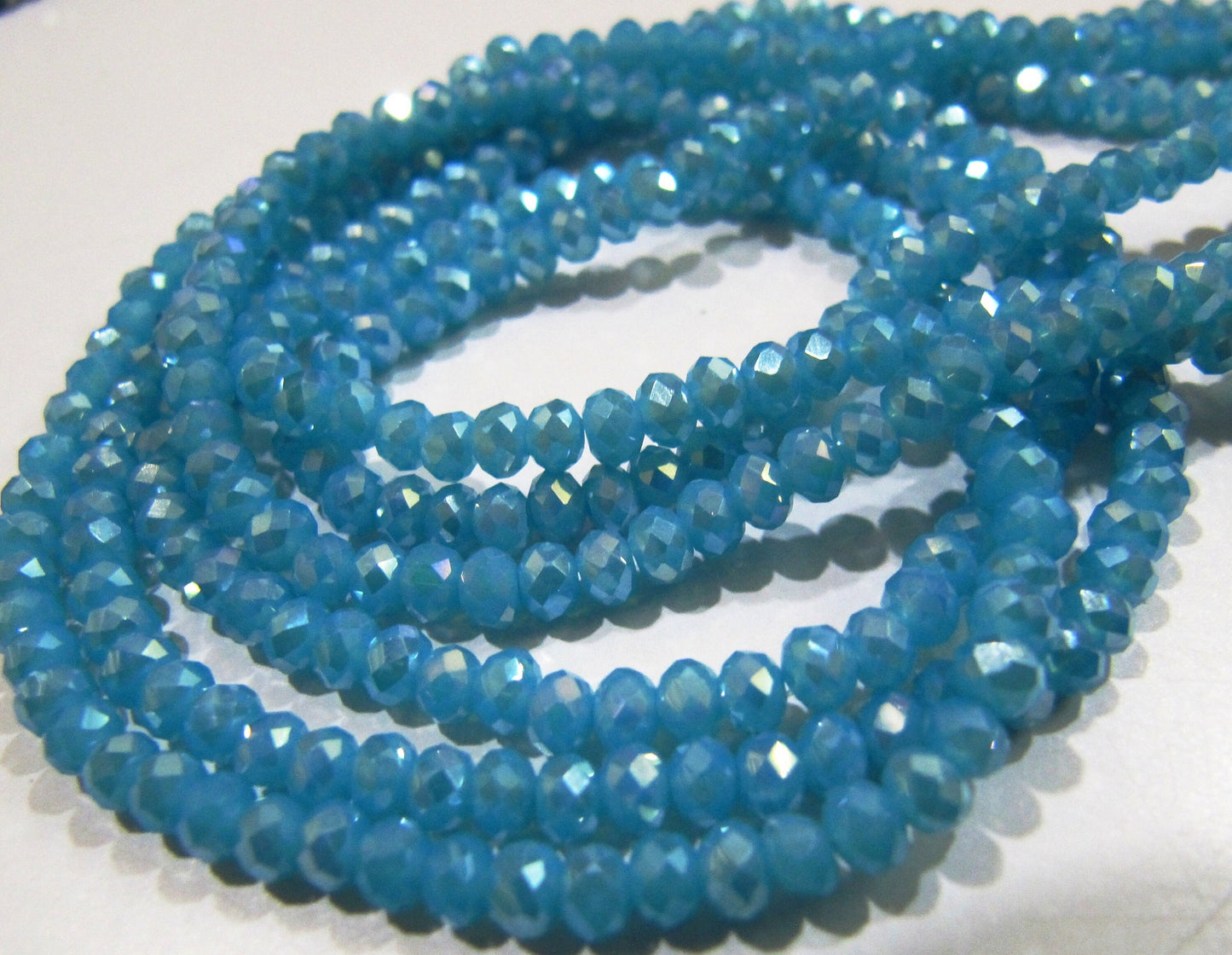 AB Coated Aqua Blue Chalcedony Hydro Quartz Rondelle Faceted Size 3-4mm Beads Strand 14 inches long Wholesale prices