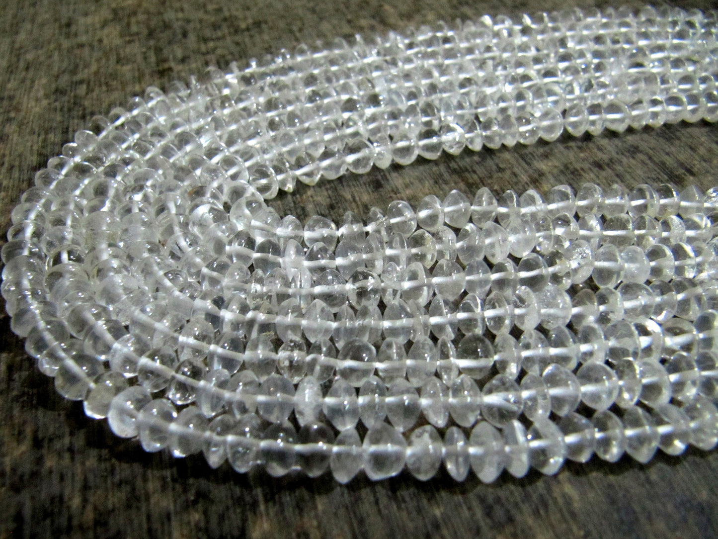 Natural Rock Crystal  Plain Smooth Button Shape 5 to 7mm Rondelle Top Quality Gemstone beads Strand 14 inches Long Wholesale Prices