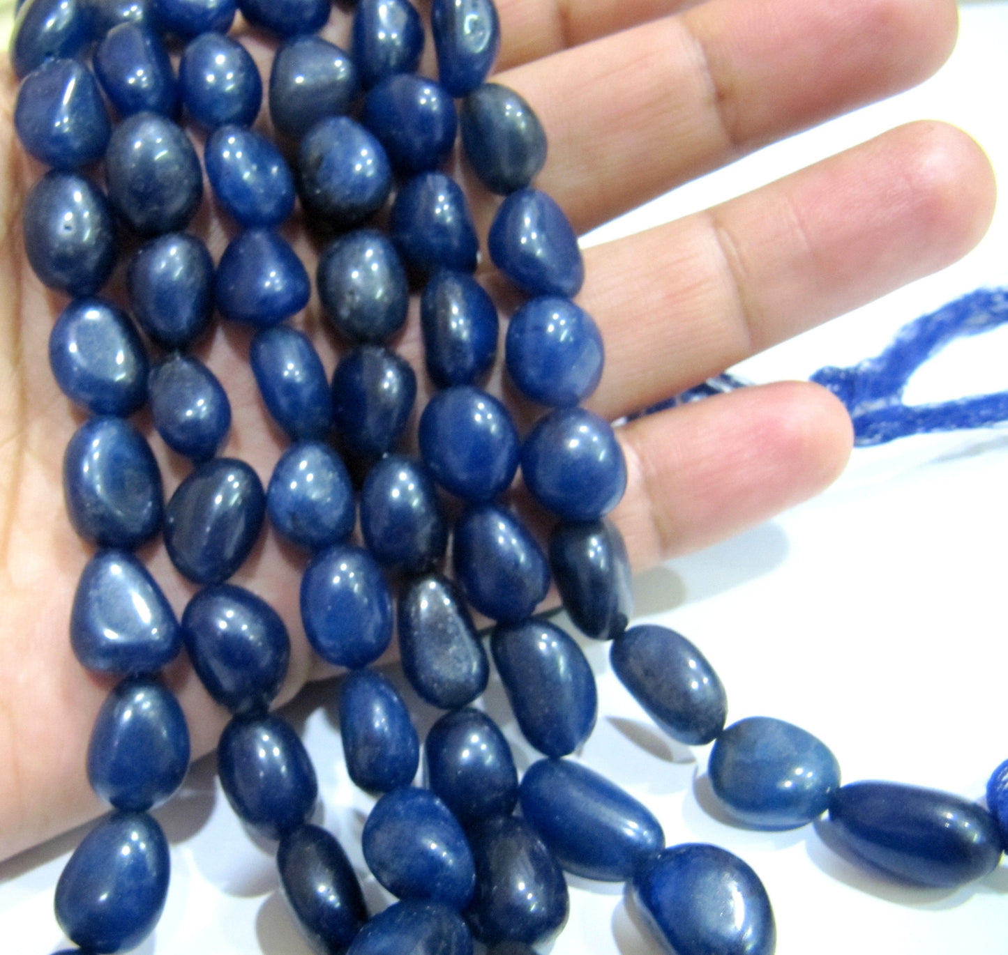 Dyed Sapphire Plain Smooth Nugget Shape Beads Smooth Tumble Oval Beads 10 to 15 mm Strand 15 inches long Gemstone Beads Wholesale Prices